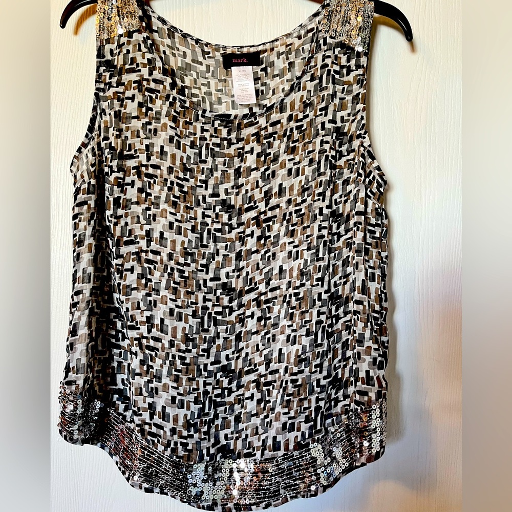 Woman’s polyester sheer tank top excellent condition